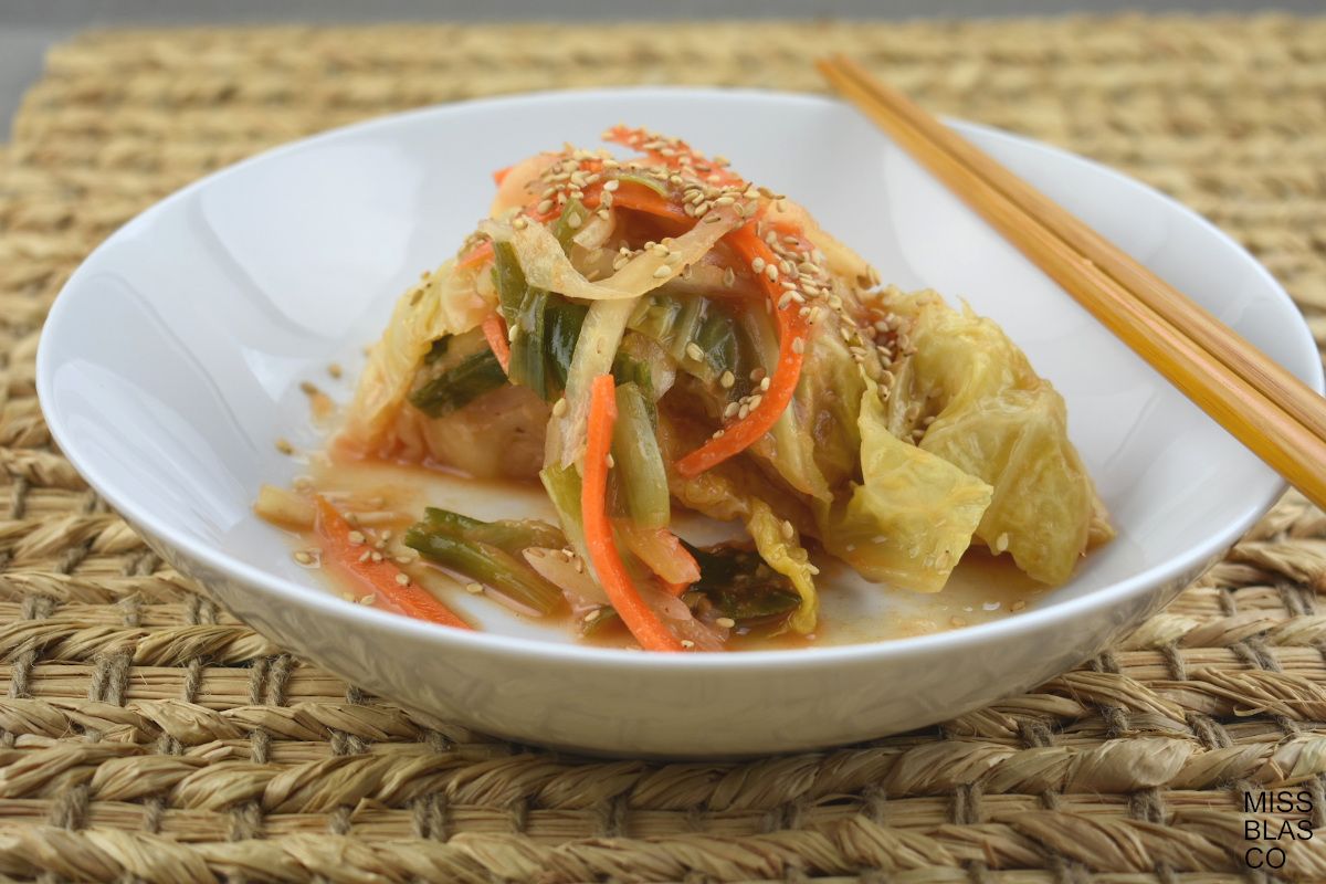 homemade kimchi in a white plate