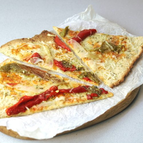 cawliflower pizza on a board