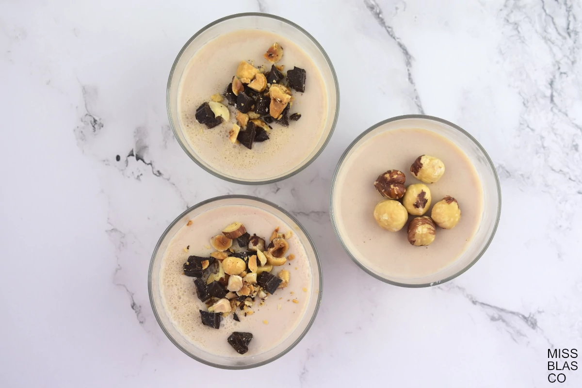 cenital view of vegan panna cotta with chocolate and nuts