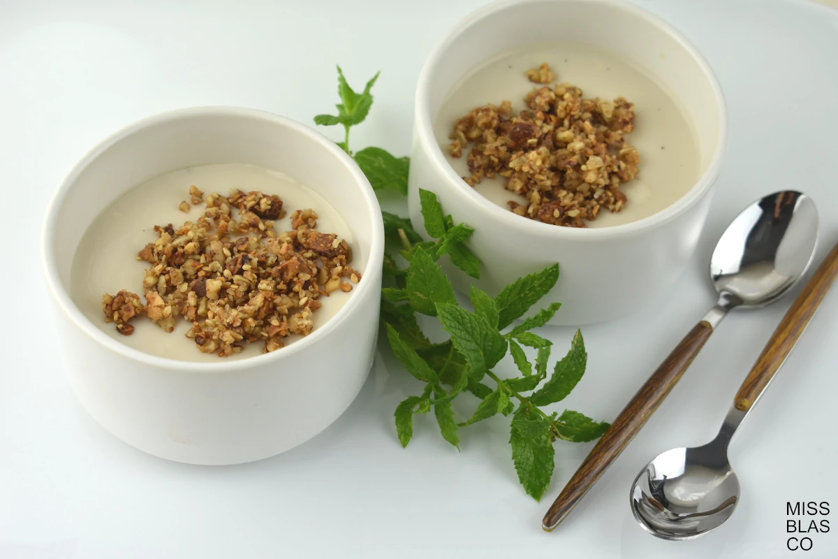 Sugar-Free Soy Custard with homemade nut crumble and mint leaves